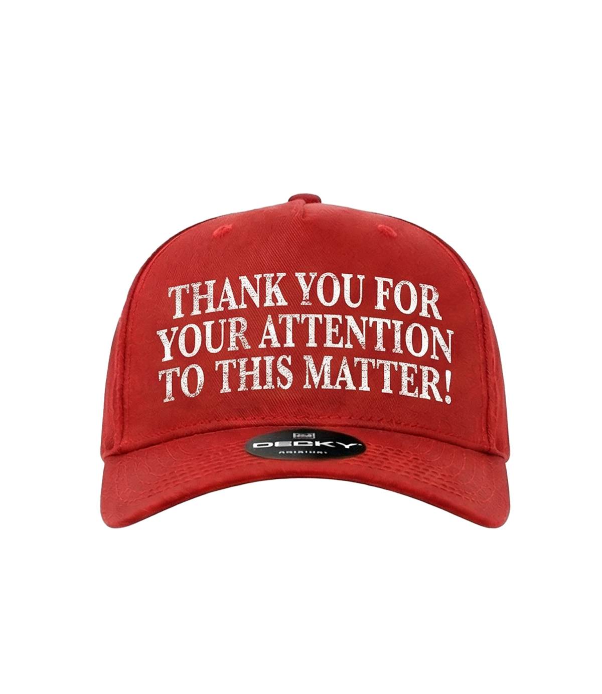 The Alex Jones Store - Red trucker hat front view with white 'Thank You For Your Attention To This Matter!' embroidered text, Decky brand