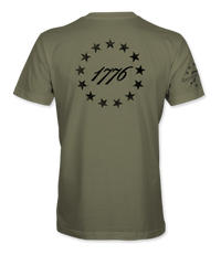 The Alex Jones Store - Back of olive green 1776 America Supply Co t-shirt with black 13-star Betsy Ross ring around 1776 numerals