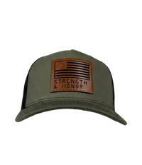The Alex Jones Store - Front view of olive green Strength & Honor leather patch trucker hat with Betsy Ross flag and slogan on black mesh