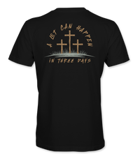 The Alex Jones Store - Back view of black 'A Lot Can Happen In Three Days' t-shirt with three crosses on a hill and tan script Easter design