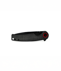 The Alex Jones Store - Closed Alex Jones Micarta Handle Blade showing black micarta grip, red pivot ring accent and slim everyday carry profile