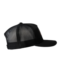 The Alex Jones Store - Right side view of black Deus Vult Patriot's Crest trucker hat showing black mesh back and USA flag-cross patch
