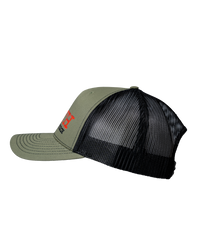 The Alex Jones Store - Truth Is The New Hate Speech Trucker Hat — Olive green and black trucker hat, left side view, showing partial red 'TRUTH' embroidery and black mesh panels