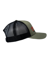 The Alex Jones Store - Truth Is The New Hate Speech Trucker Hat — Olive green and black trucker hat, right side view, with mesh back panels and 'TRUTH' embroidery visible on front