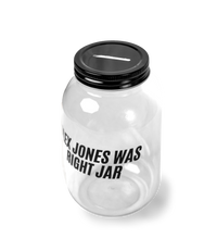 The Alex Jones Store - Three-quarter angle of clear plastic Alex Jones Was Right Jar with black coin-slot lid, collectible memento bank