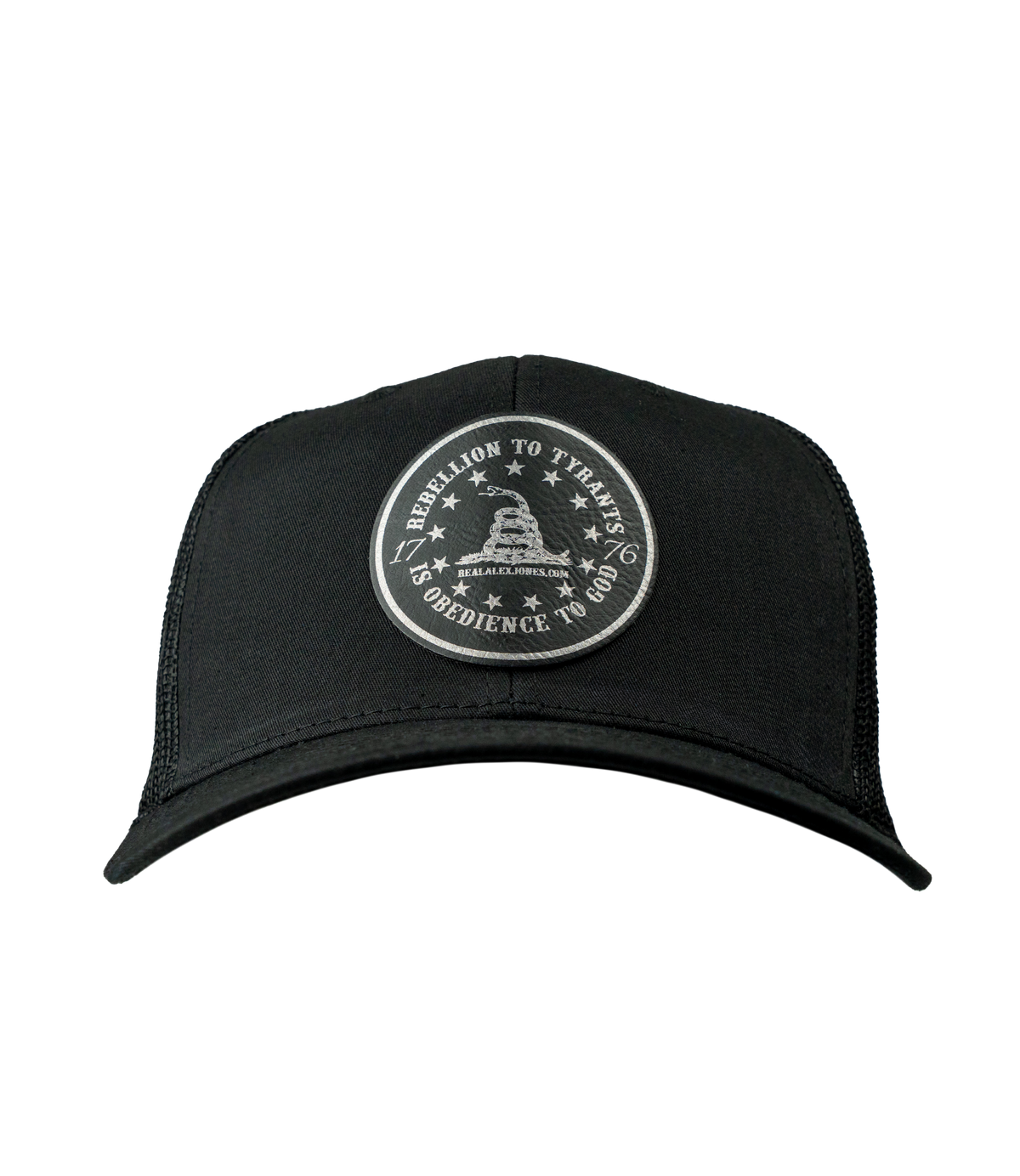The Alex Jones Store - Front of black trucker hat with circular leather patch reading 'Rebellion To Tyrants Is Obedience To God' with Gadsden snake