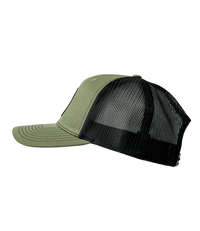 The Alex Jones Store - "You Shall Conquer" Leather Patch Hat — Left side profile of olive green trucker hat with curved brim and black mesh back ventilation